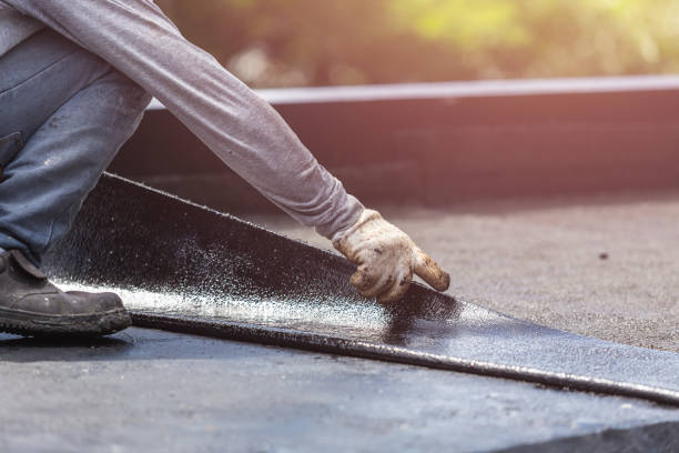 Professional Basement Waterproofing technician working in Fennville, MI